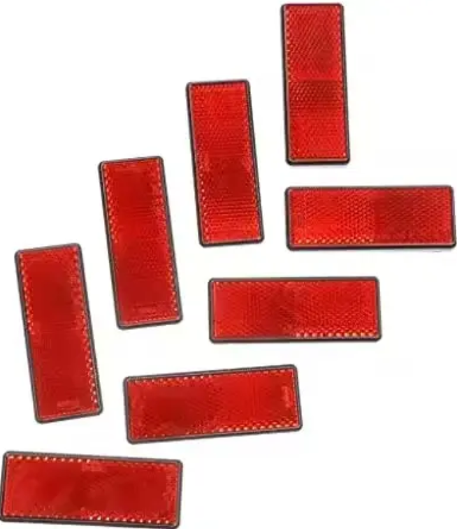 Catadioptru dreptunghiular autoadeziv 86x40 mm Rosu